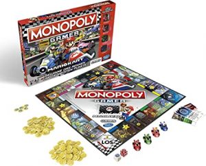 Le jeu de société Monopoly Gamer Mario Kart est déballé devant sa boîte.